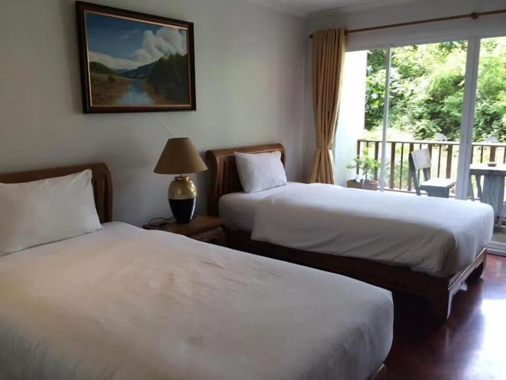 Bed in Chada Thai House