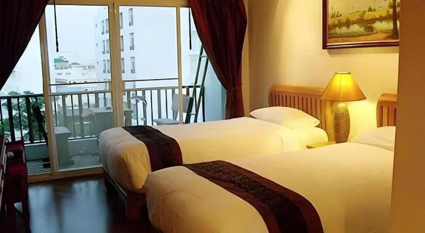 Bed in Chada Thai House