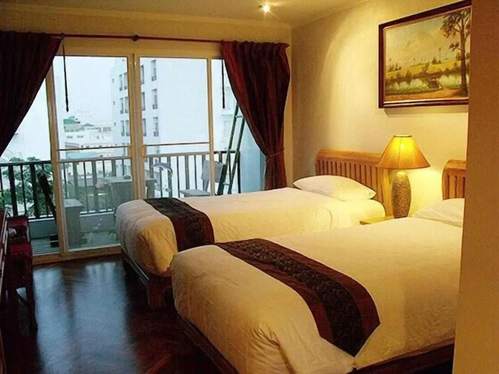 Bed in Chada Thai House