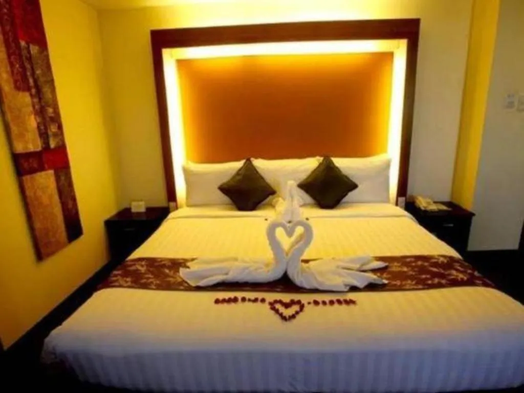 Bed in The Ritz Hotel at Garden Oases