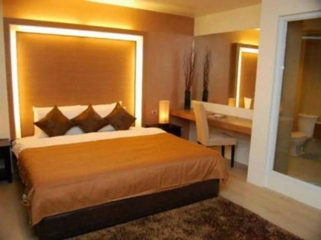 Bed in The Ritz Hotel at Garden Oases