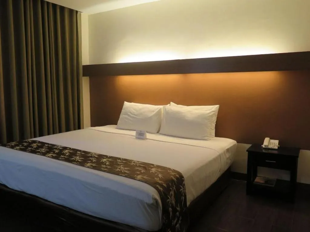 Bed in The Ritz Hotel at Garden Oases