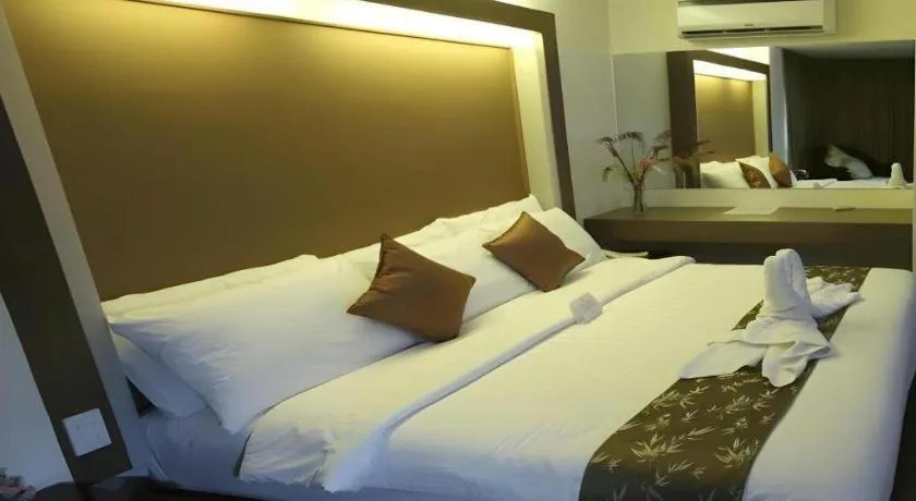 Bed in The Ritz Hotel at Garden Oases