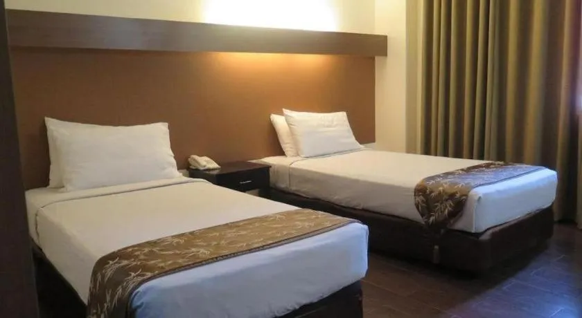 Bed in The Ritz Hotel at Garden Oases