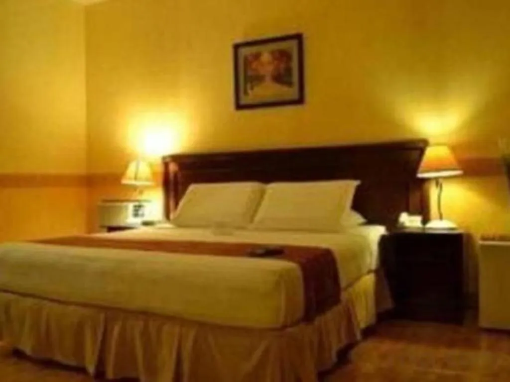 Bed in The Ritz Hotel at Garden Oases