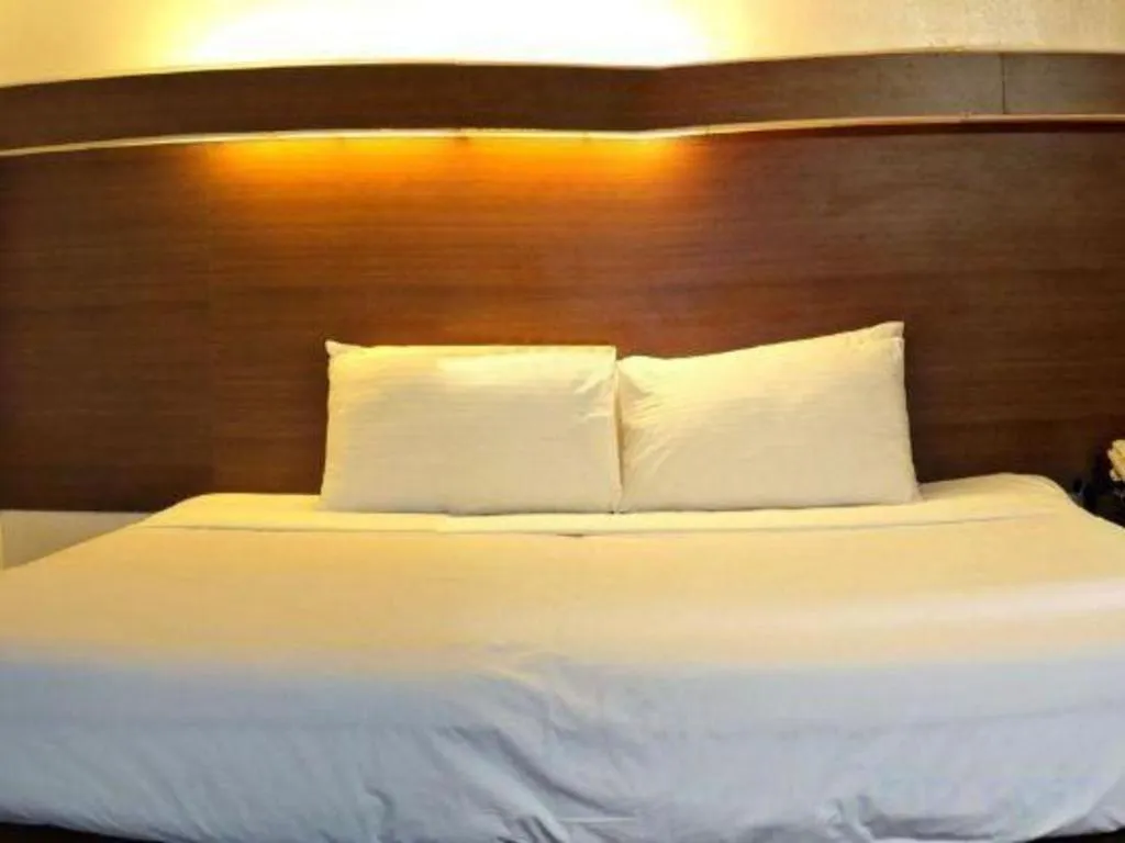 Bed in The Ritz Hotel at Garden Oases