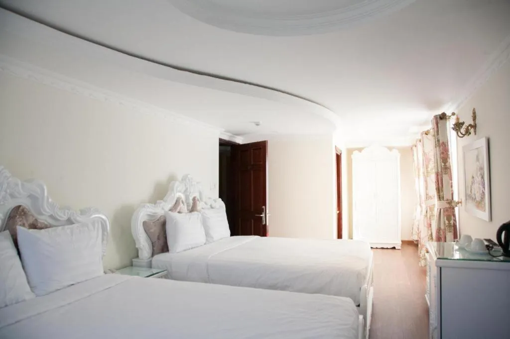 Bed in Hoa Sen Vang Hotel Dalat