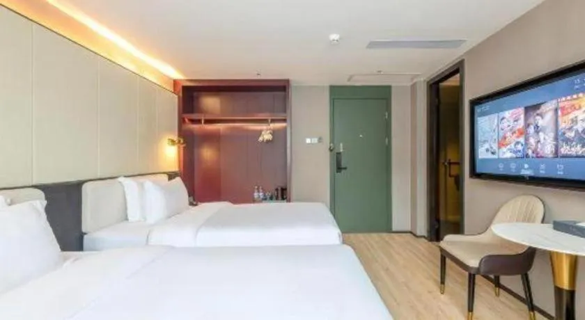 Bed in Bravo Business Hotel