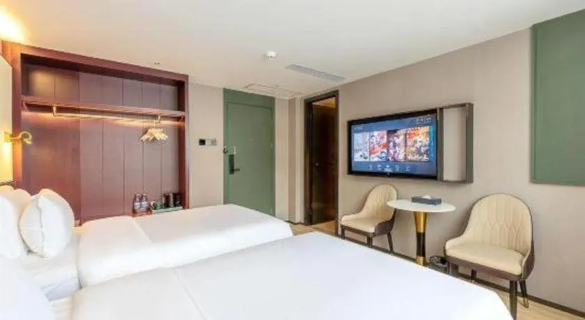 Bed in Bravo Business Hotel