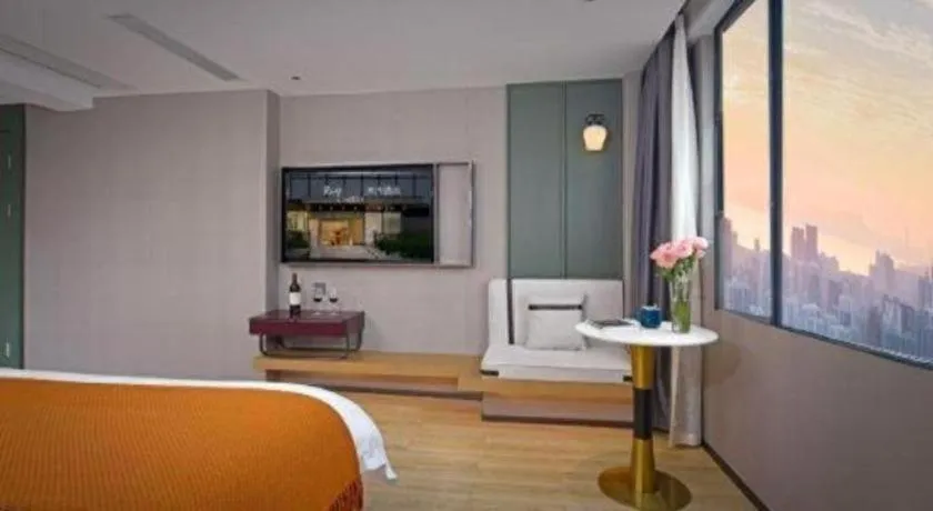 Bed in Bravo Business Hotel