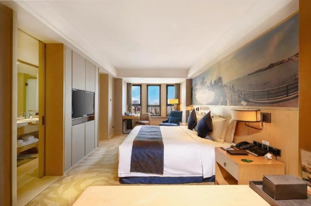 Bed in Sky World Hotel Qingdao