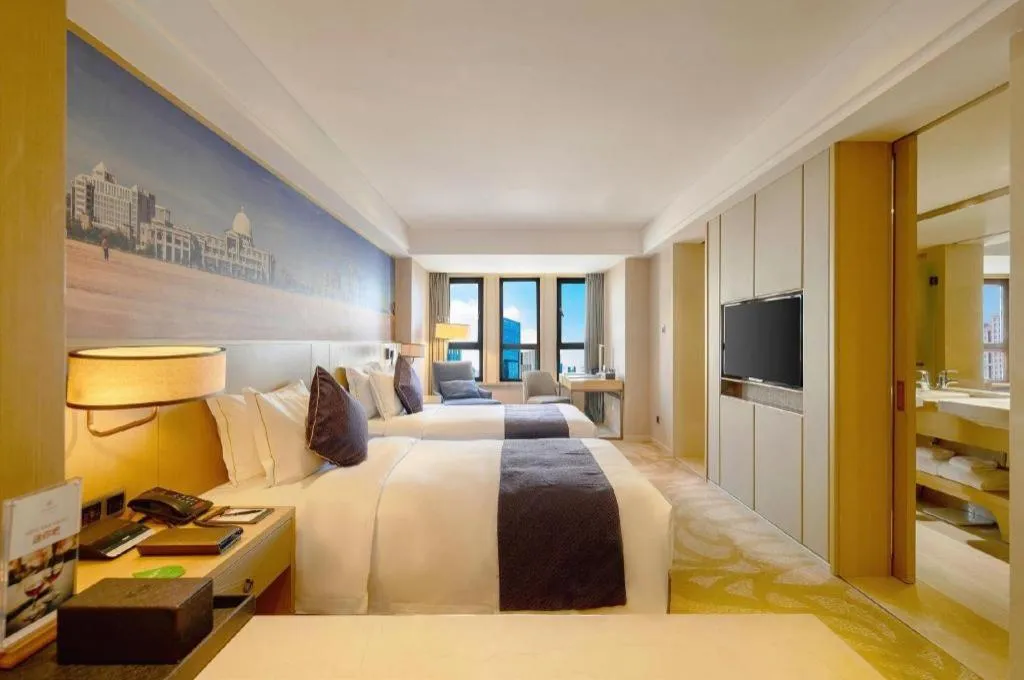 Bed in Sky World Hotel Qingdao