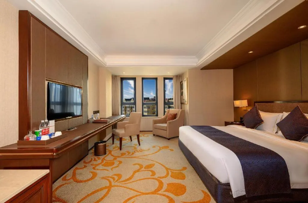 Bed in Sky World Hotel Qingdao