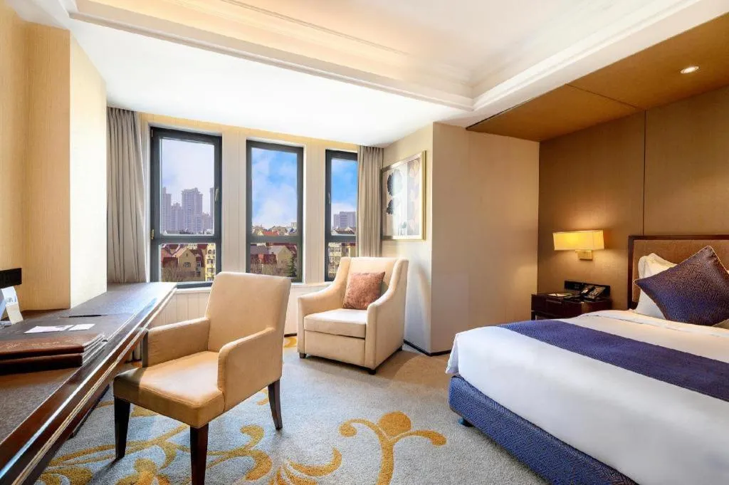 Bed in Sky World Hotel Qingdao