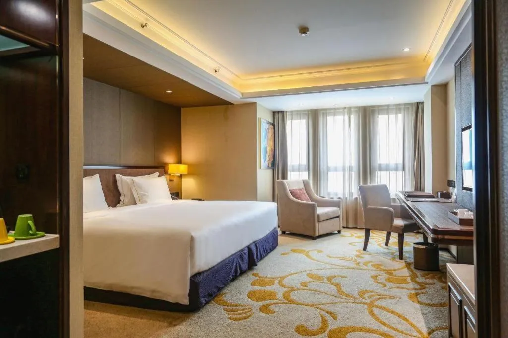 Bed in Sky World Hotel Qingdao