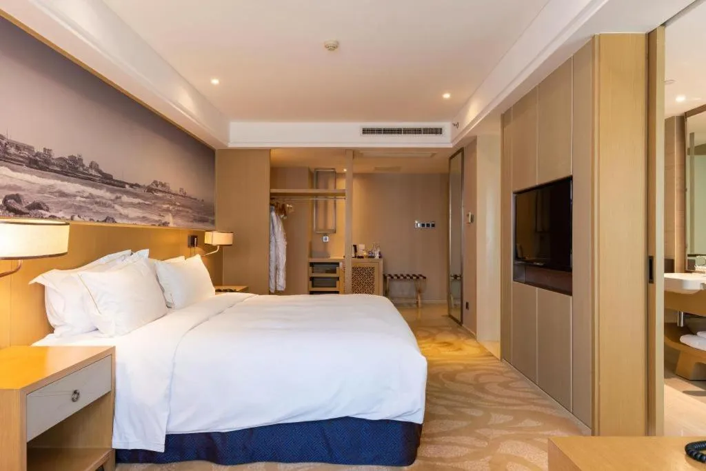 Bed in Sky World Hotel Qingdao