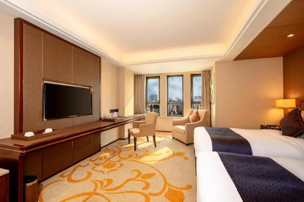 Bed in Sky World Hotel Qingdao