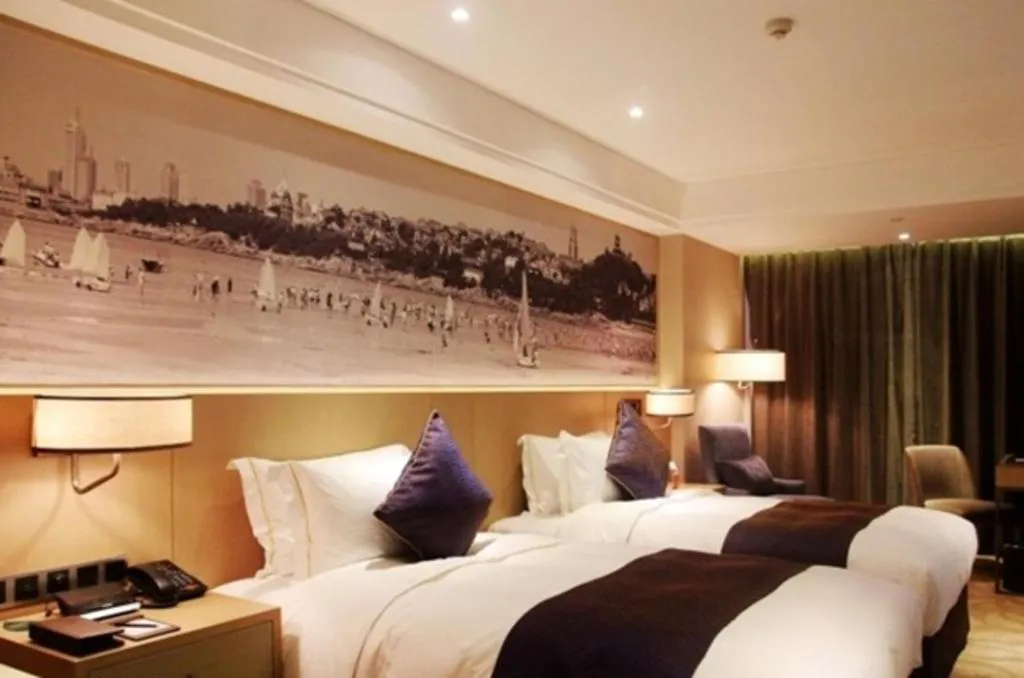 Bed in Sky World Hotel Qingdao