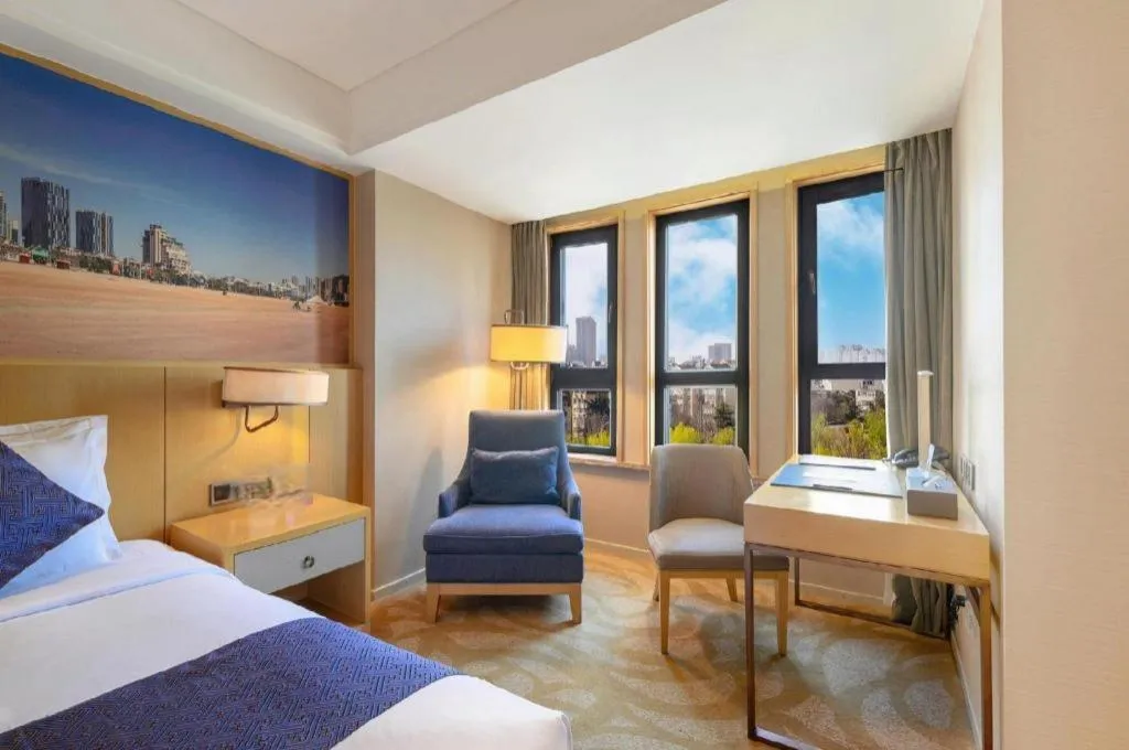 Bed in Sky World Hotel Qingdao