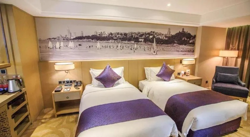 Bed in Sky World Hotel Qingdao