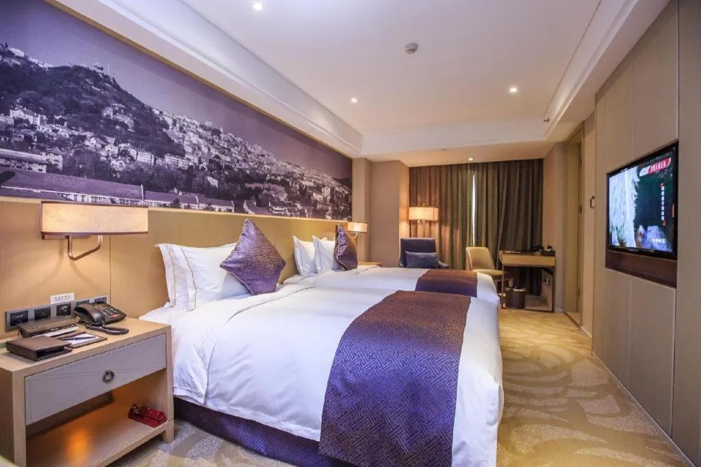 Bed in Sky World Hotel Qingdao