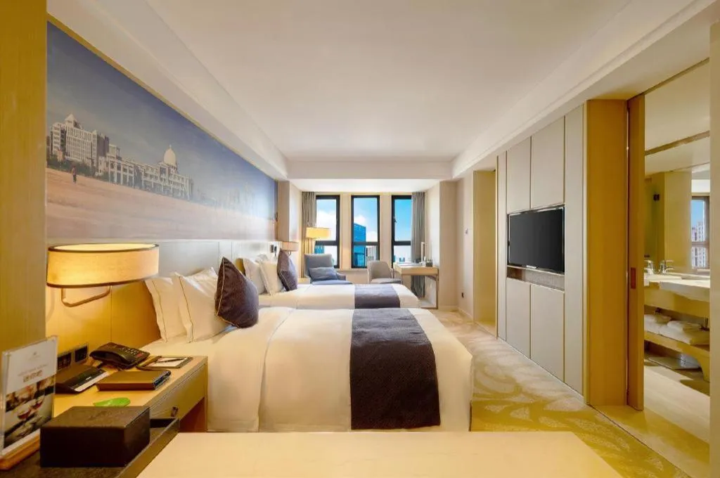 Bed in Sky World Hotel Qingdao