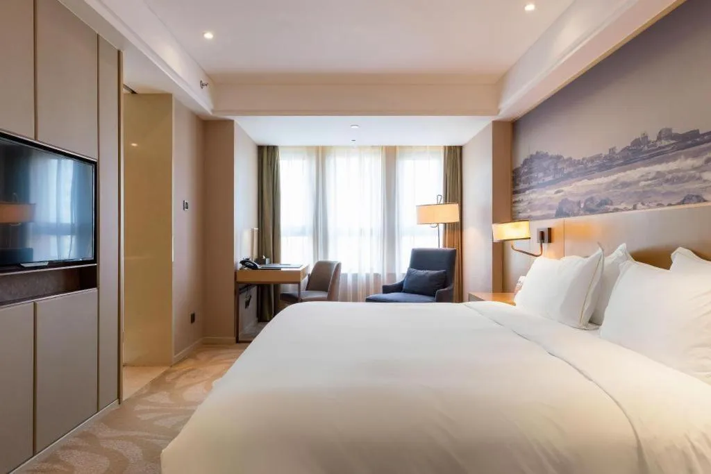 Bed in Sky World Hotel Qingdao