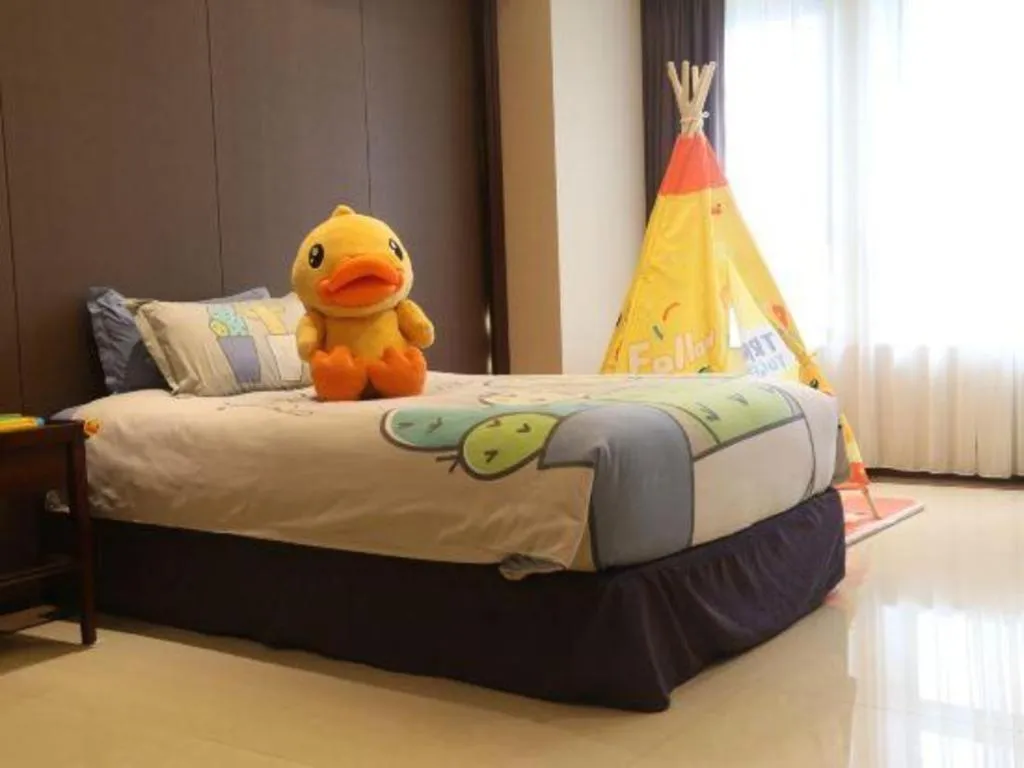 Bed in Sky World Hotel Qingdao