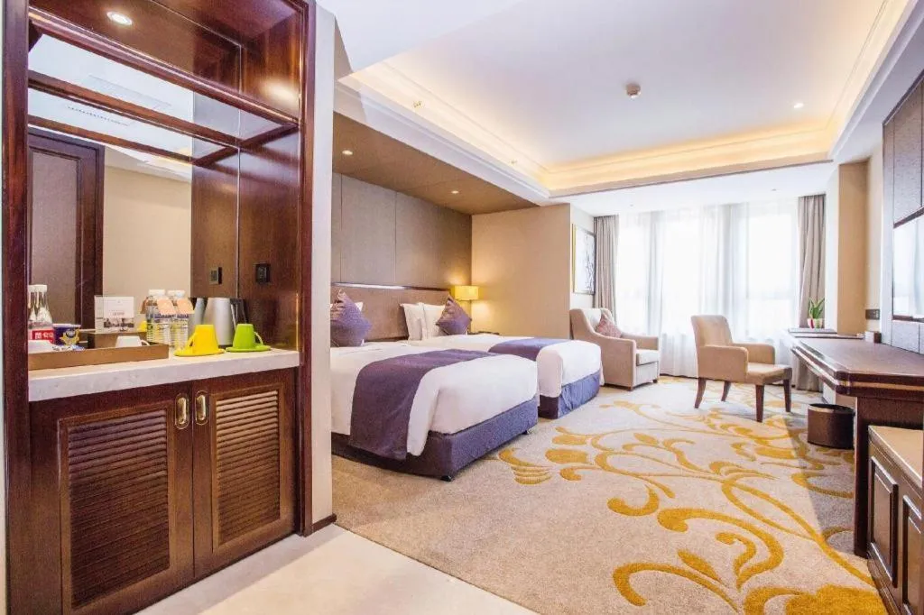 Bed in Sky World Hotel Qingdao