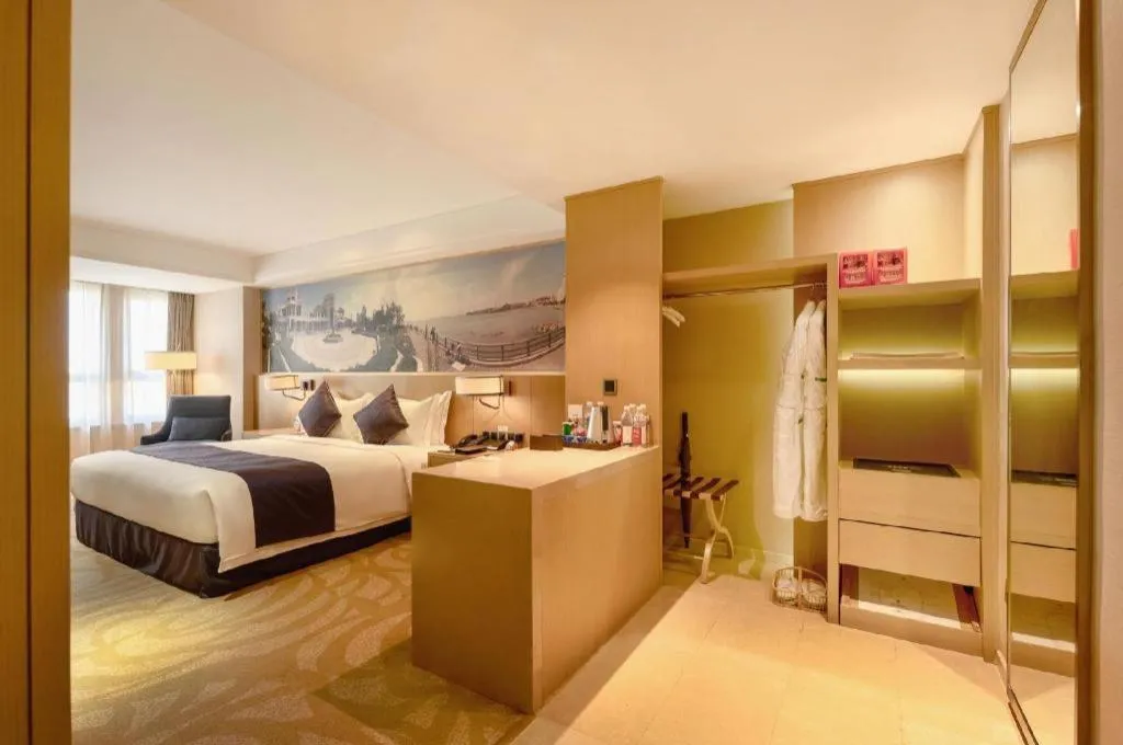 Bed in Sky World Hotel Qingdao