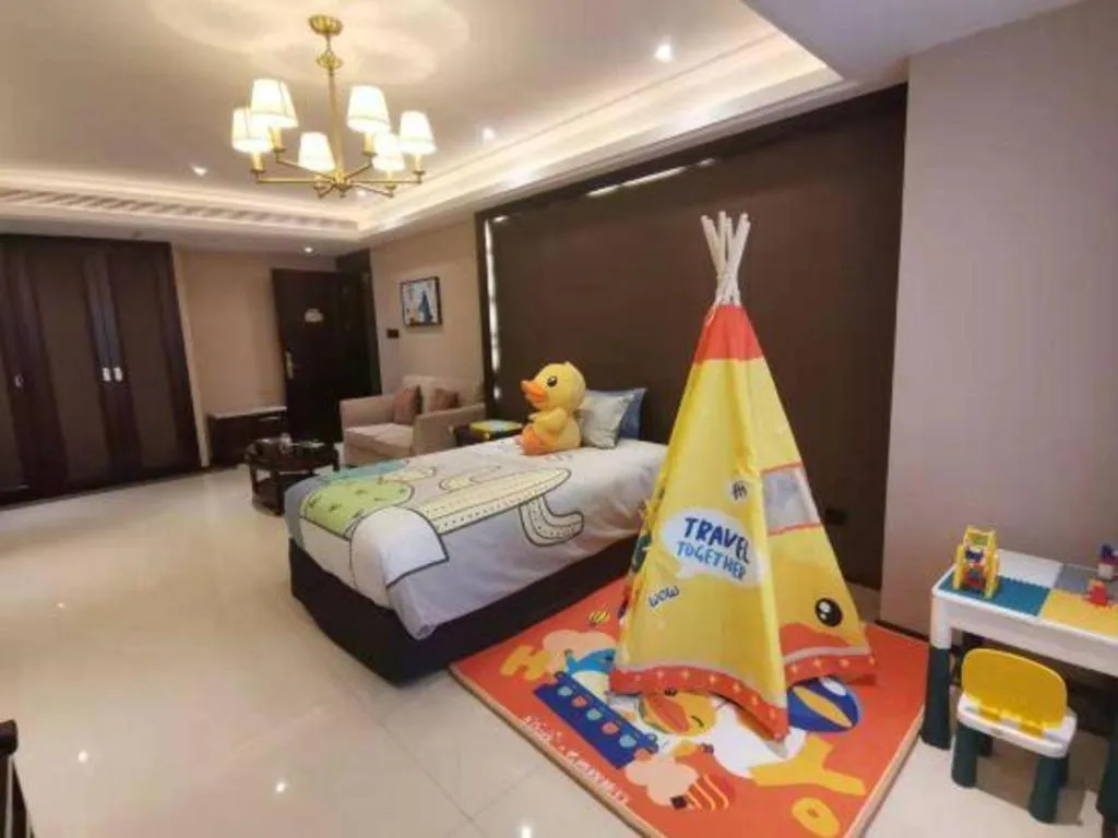 Bed in Sky World Hotel Qingdao