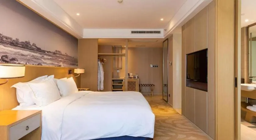 Bed in Sky World Hotel Qingdao