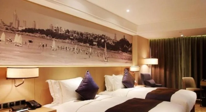 Bed in Sky World Hotel Qingdao