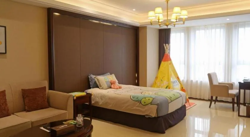 Bed in Sky World Hotel Qingdao