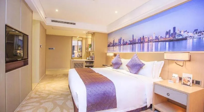 Bed in Sky World Hotel Qingdao