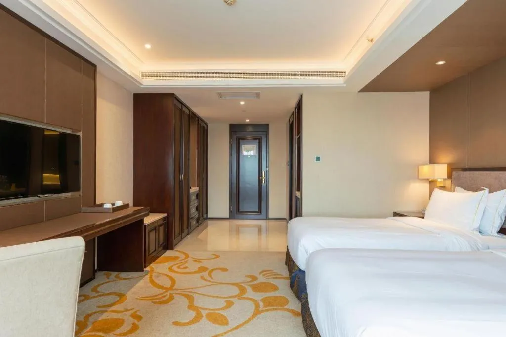 Bed in Sky World Hotel Qingdao