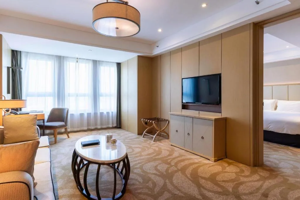 Bed in Sky World Hotel Qingdao