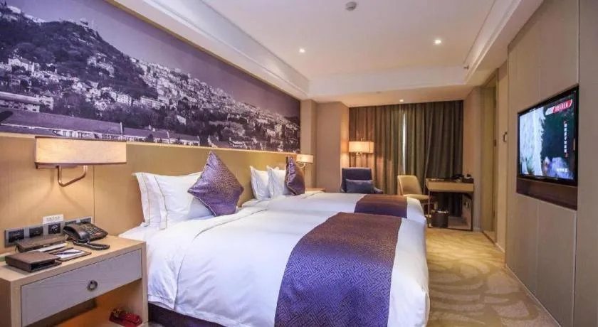 Bed in Sky World Hotel Qingdao