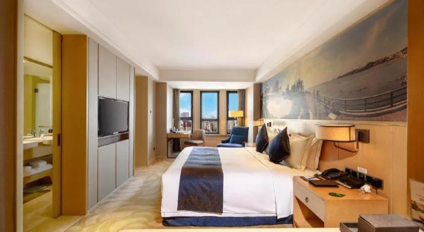 Bed in Sky World Hotel Qingdao