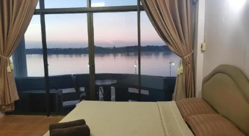 Bed in Just Mansion Hotel