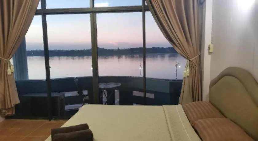 Bed in Just Mansion Hotel