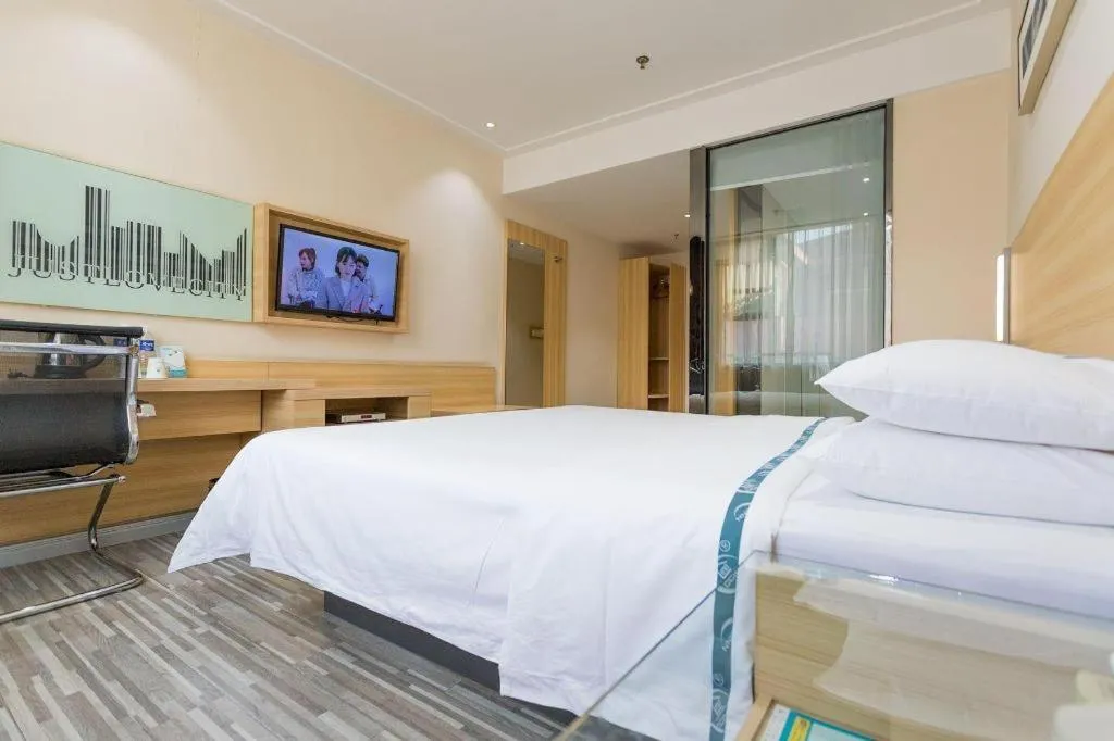 Bed in City Comfort Inn Huanggang Guibinlou Wanda Square