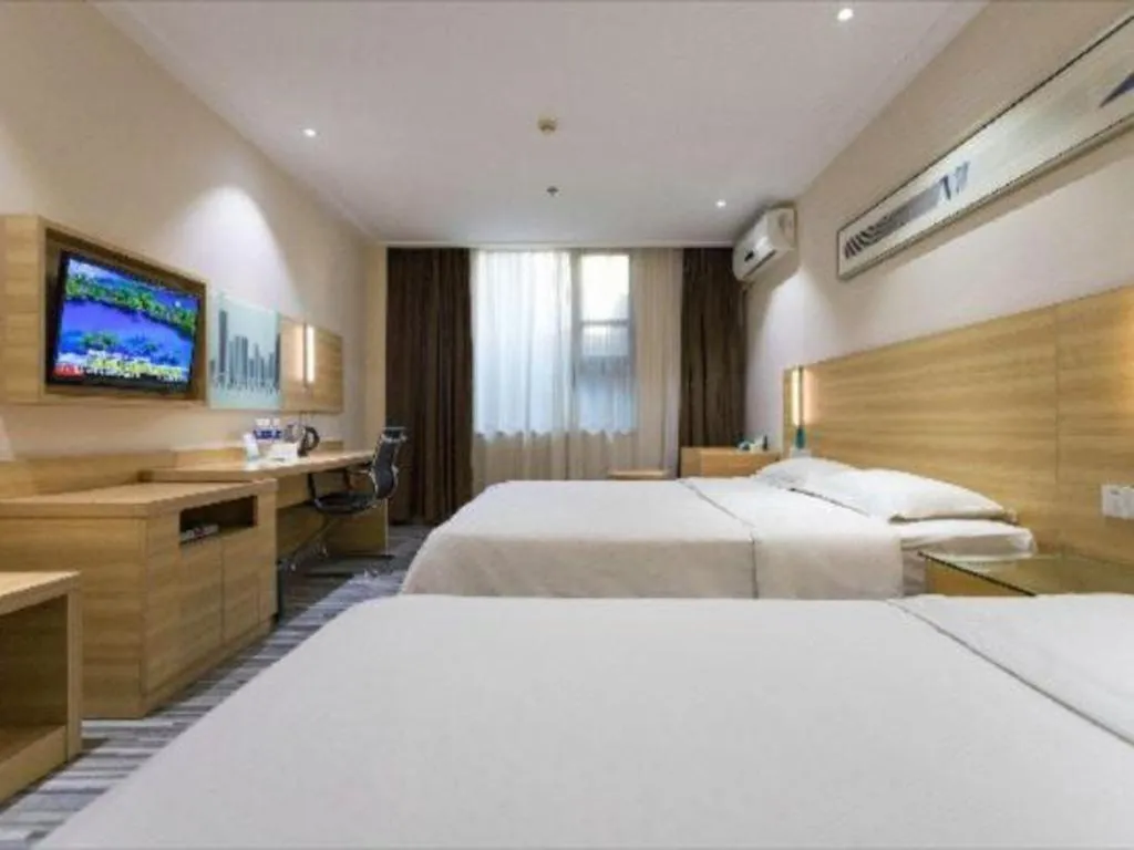 Bed in City Comfort Inn Huanggang Guibinlou Wanda Square