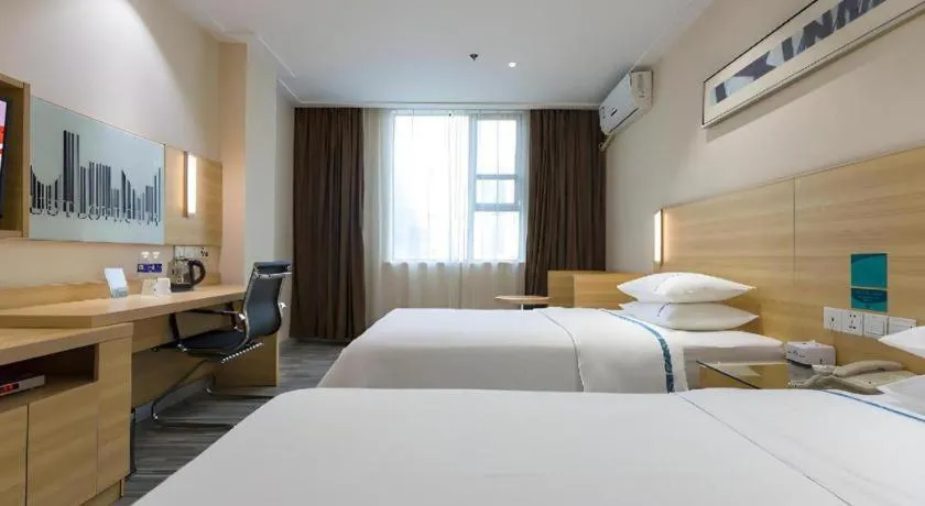 Bed in City Comfort Inn Huanggang Guibinlou Wanda Square