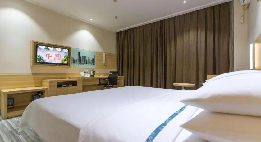 Bed in City Comfort Inn Huanggang Guibinlou Wanda Square