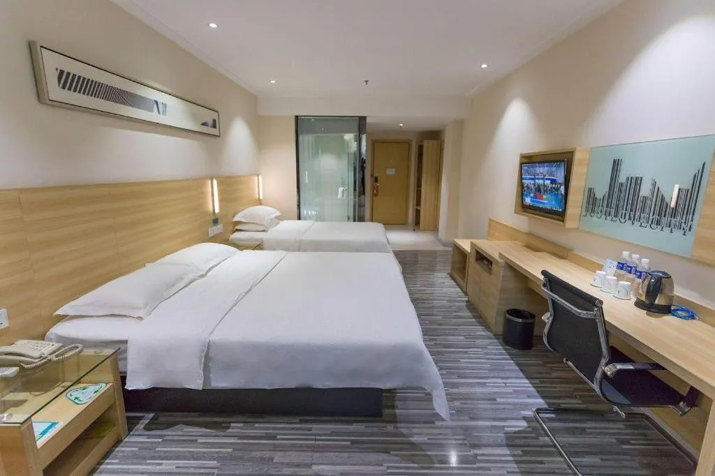 Bed in City Comfort Inn Huanggang Guibinlou Wanda Square