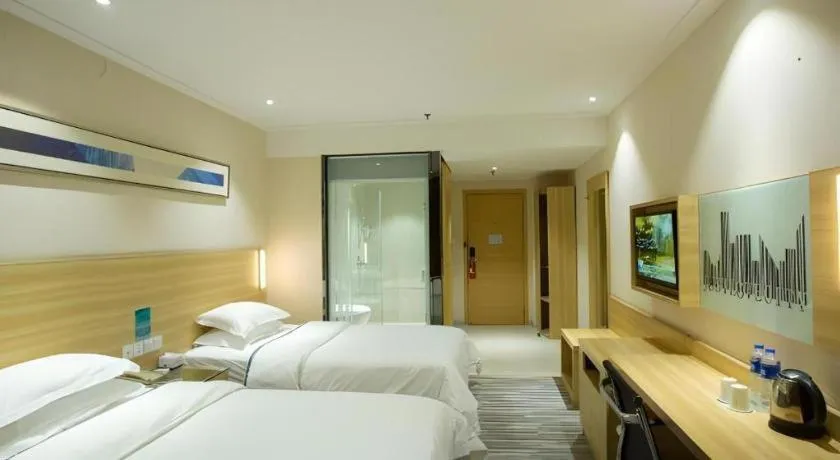 Bed in City Comfort Inn Huanggang Guibinlou Wanda Square