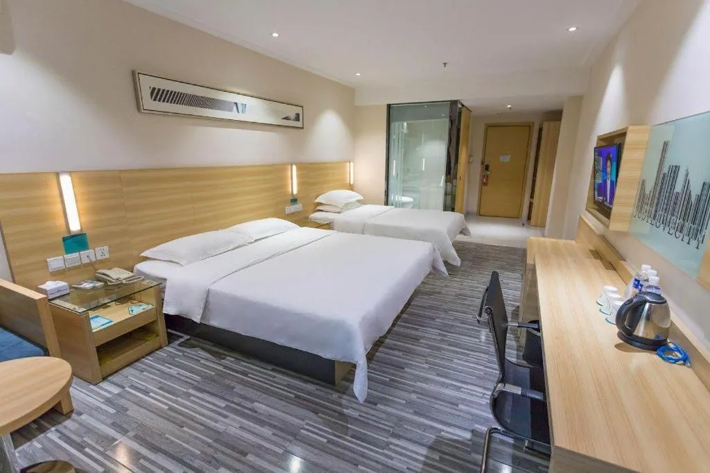 Bed in City Comfort Inn Huanggang Guibinlou Wanda Square