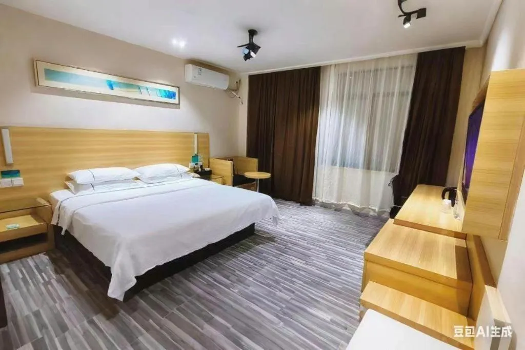 Bed in City Comfort Inn Huanggang Guibinlou Wanda Square