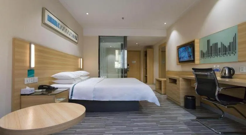 Bed in City Comfort Inn Huanggang Guibinlou Wanda Square